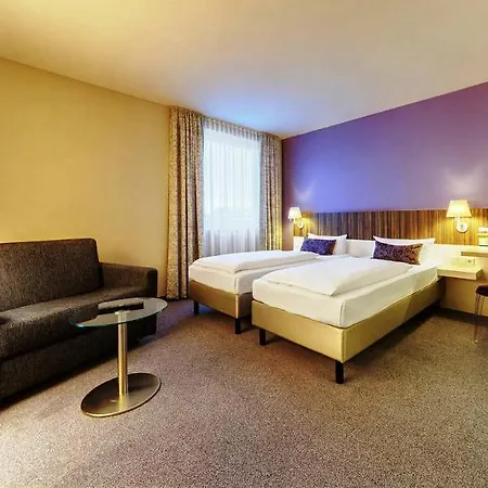 Acomhotel فندق